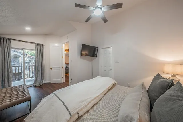 a bathroom with a shower and a toilet
