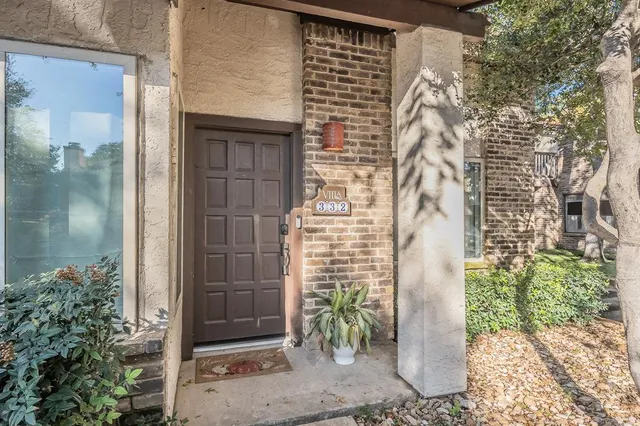 a bathroom with a shower and a mirror