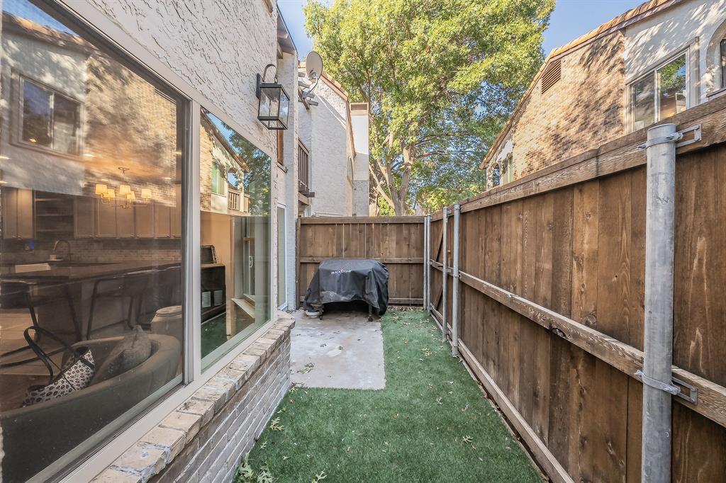 14151 Montfort Drive, Unit 332 Dallas, TX 75254 - Photo 32 of 35 a view of a porch with a yard