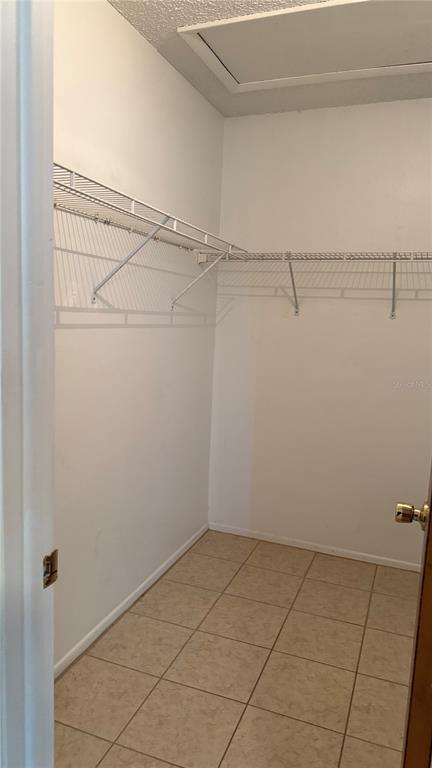 3956 Elvira Court New Port Richey, FL 34655 - Photo 11 of 21 a view of a room with racks on the wall