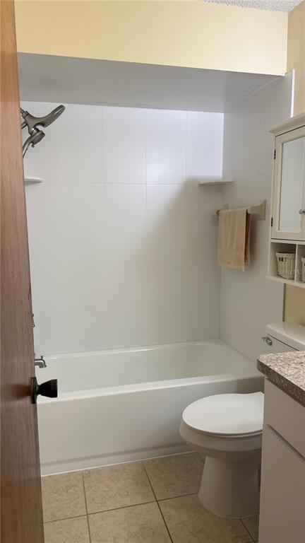 3956 Elvira Court New Port Richey, FL 34655 - Photo 12 of 21 a white toilet sitting next to a bath tub