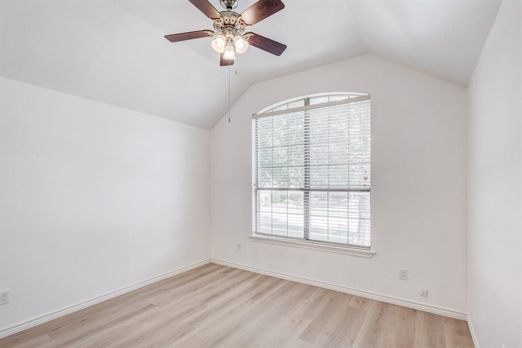 12405 Ark Road Frisco, TX 75035 - Photo 9 of 34 Bonus room featuring ceiling fan and light wood-style floors
