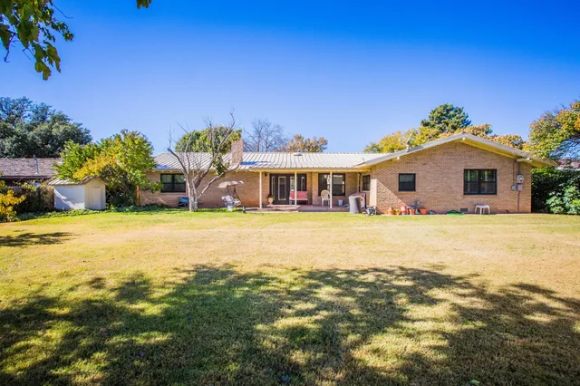 a view of a house with a swimming pool