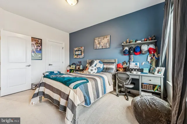 a bedroom with furniture and a bed