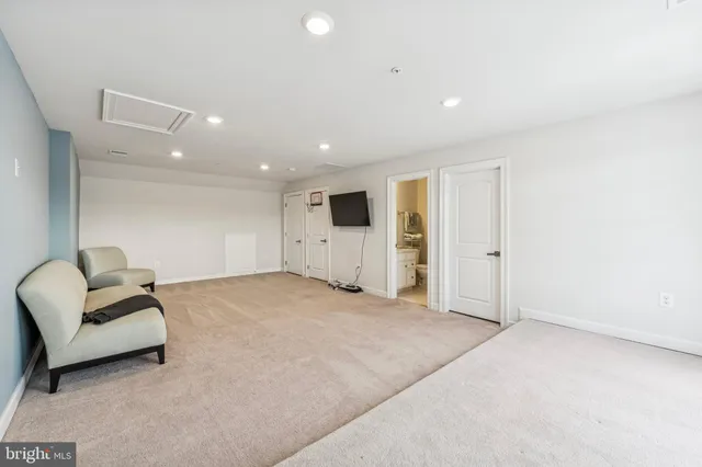 a view of a livingroom with a couch and a couch