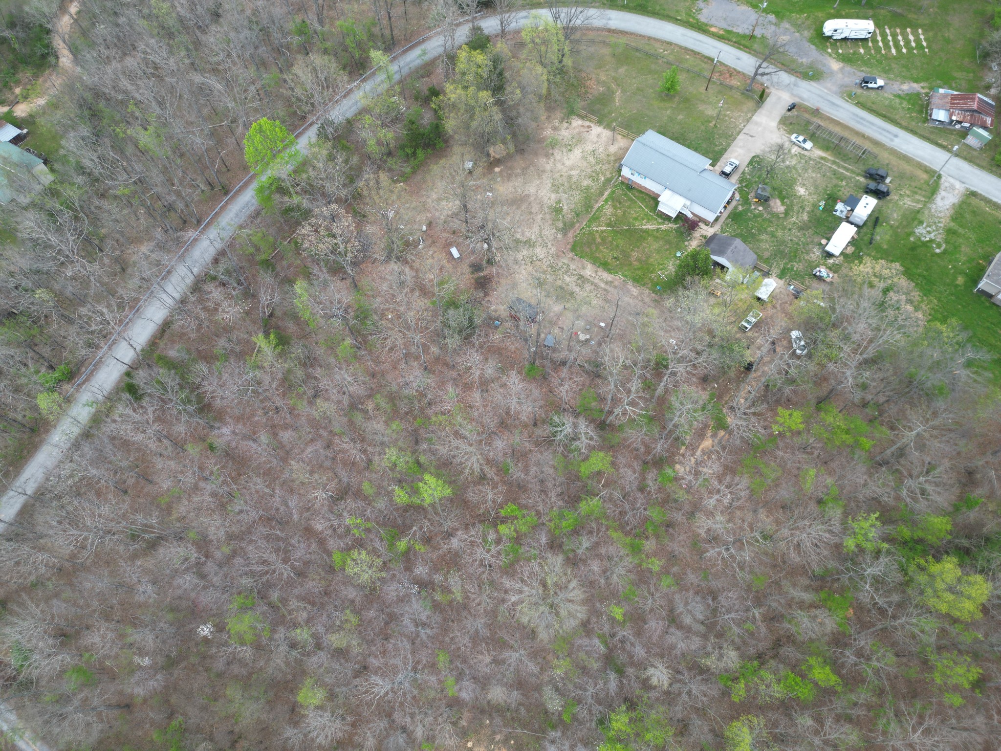 150 Deerwood Road Hohenwald, TN 38462 - Photo 2 of 56 a view of a yard