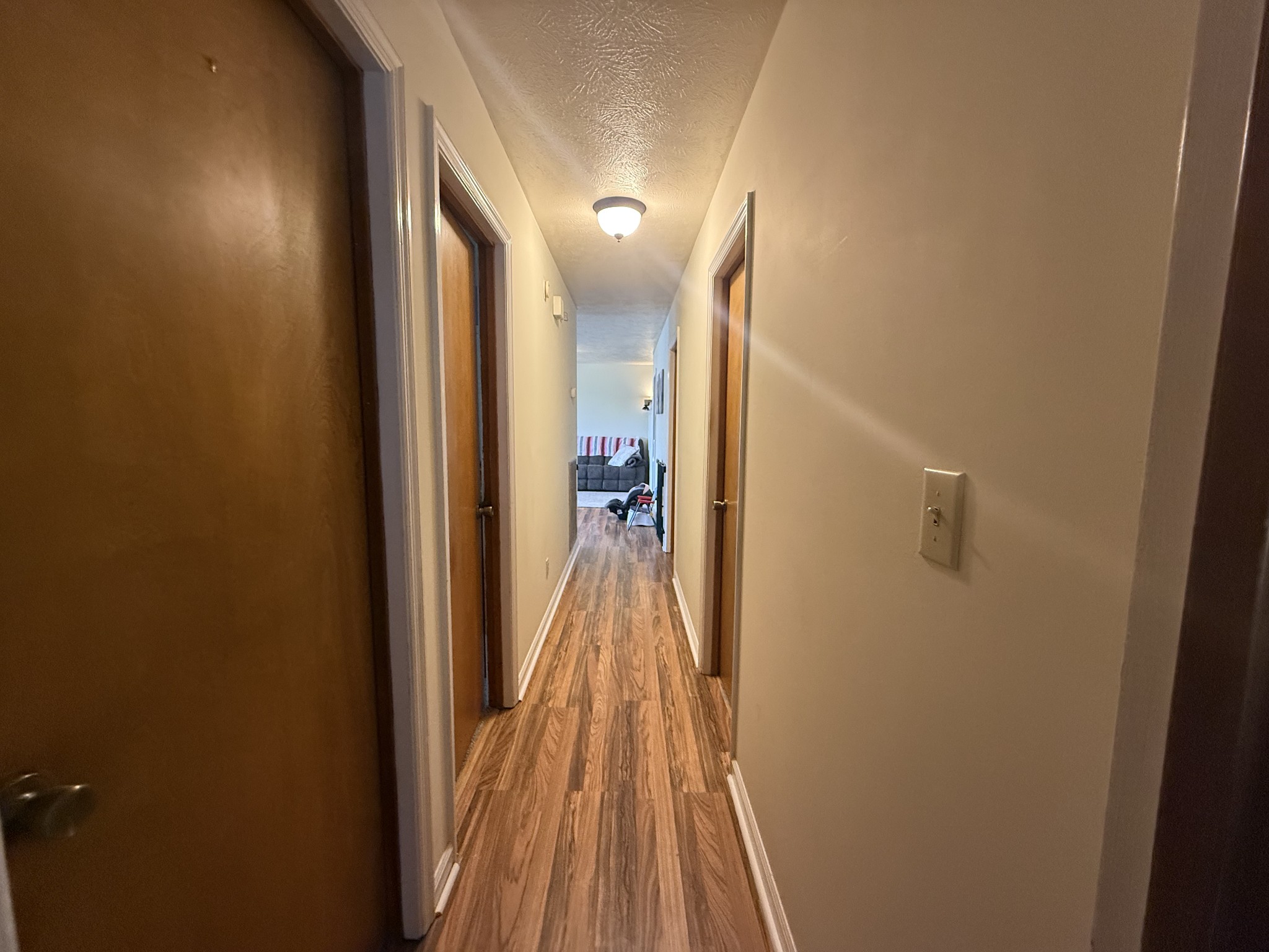 150 Deerwood Road Hohenwald, TN 38462 - Photo 21 of 56 a view of a bathroom from a hallway