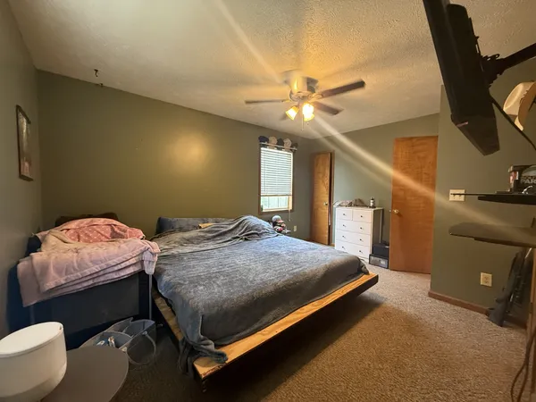 a bathroom with a glass door shower