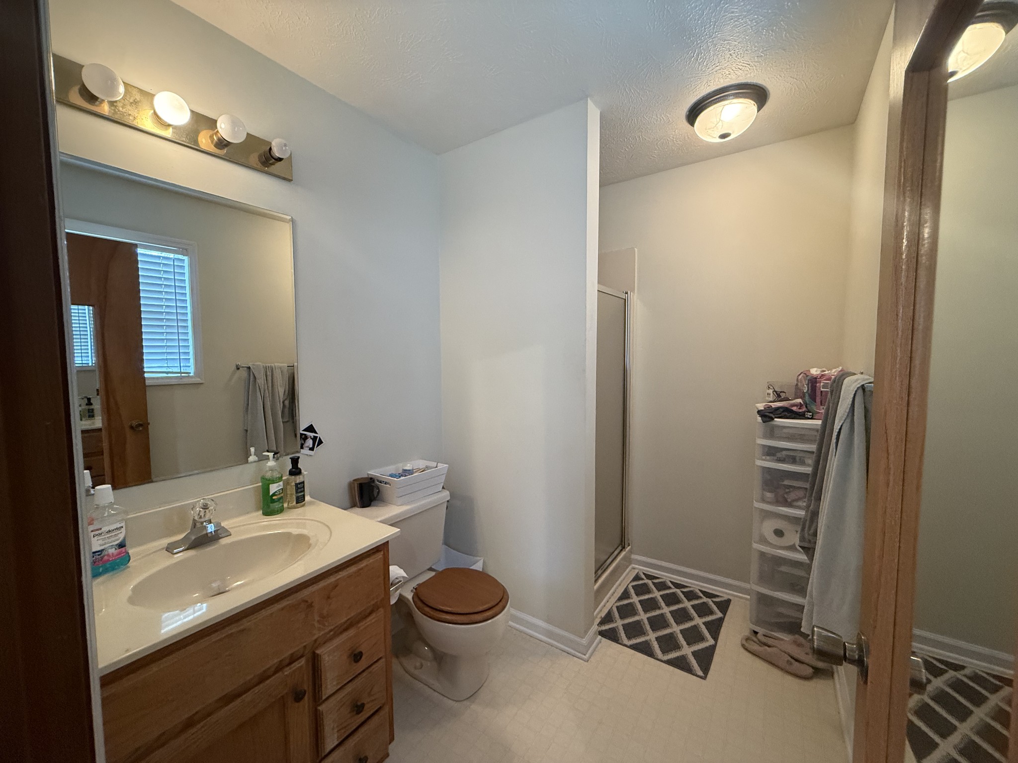 150 Deerwood Road Hohenwald, TN 38462 - Photo 34 of 56 a bathroom with a sink a toilet and shower