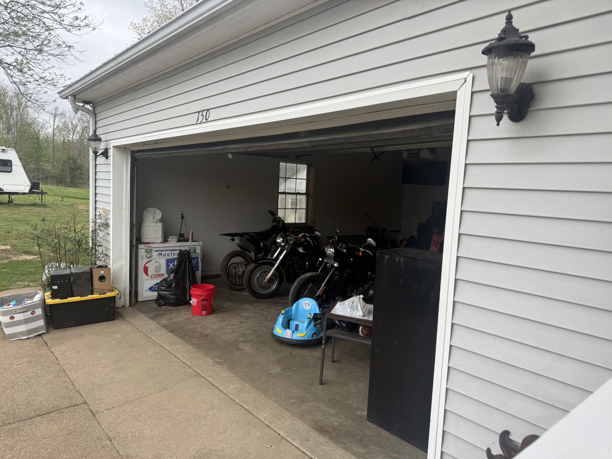 150 Deerwood Road Hohenwald, TN 38462 - Photo 41 of 56 a view of a garage with stuff