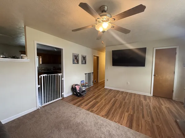 a view of a livingroom with a flat screen tv