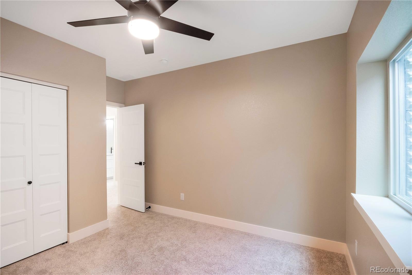 1220 Swainson Road Eaton, CO 80615 - Photo 25 of 35 a view of an empty room and window