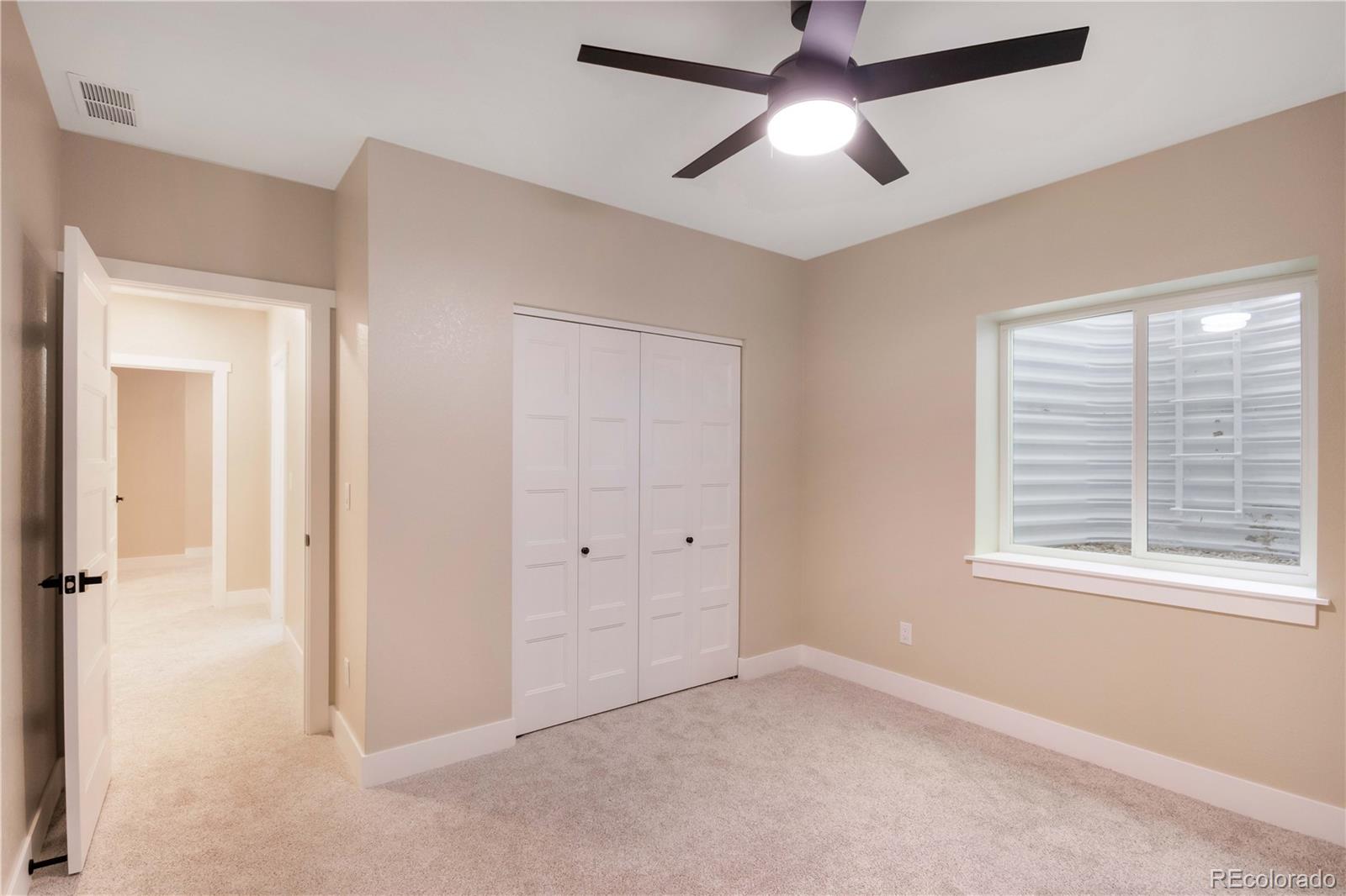 1220 Swainson Road Eaton, CO 80615 - Photo 26 of 35 a view of an empty room with a window