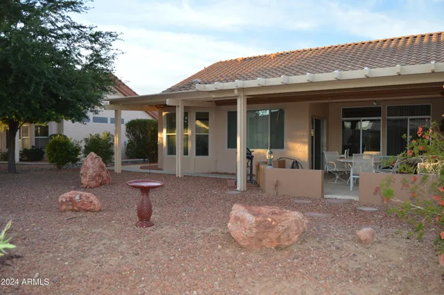 a front view of a house with patio