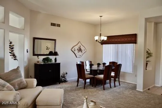 a view of a livingroom with furniture and window