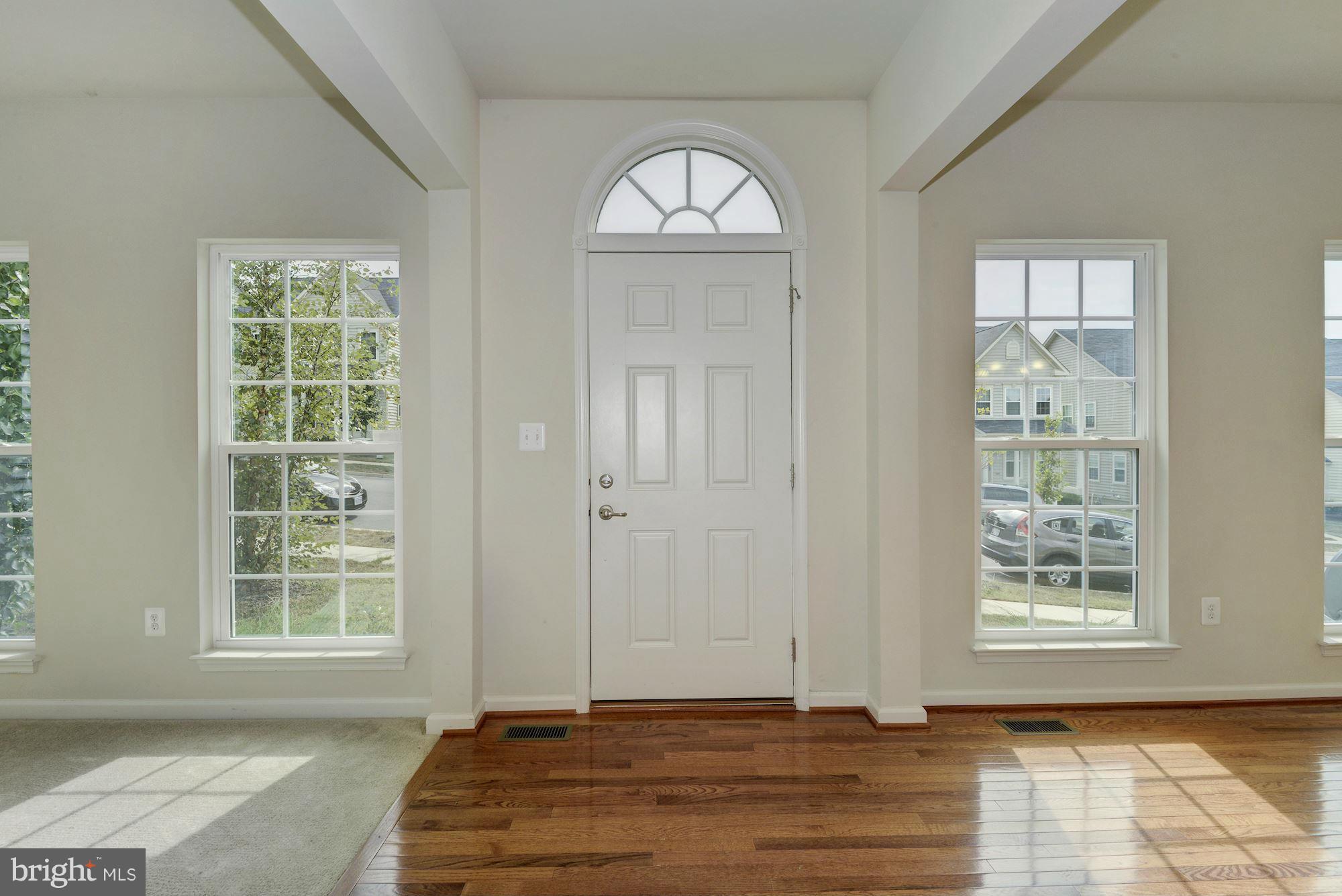 2644 St Marys View Road Accokeek, MD 20607 - Photo 2 of 29 a view of a livingroom with wooden floor and a window