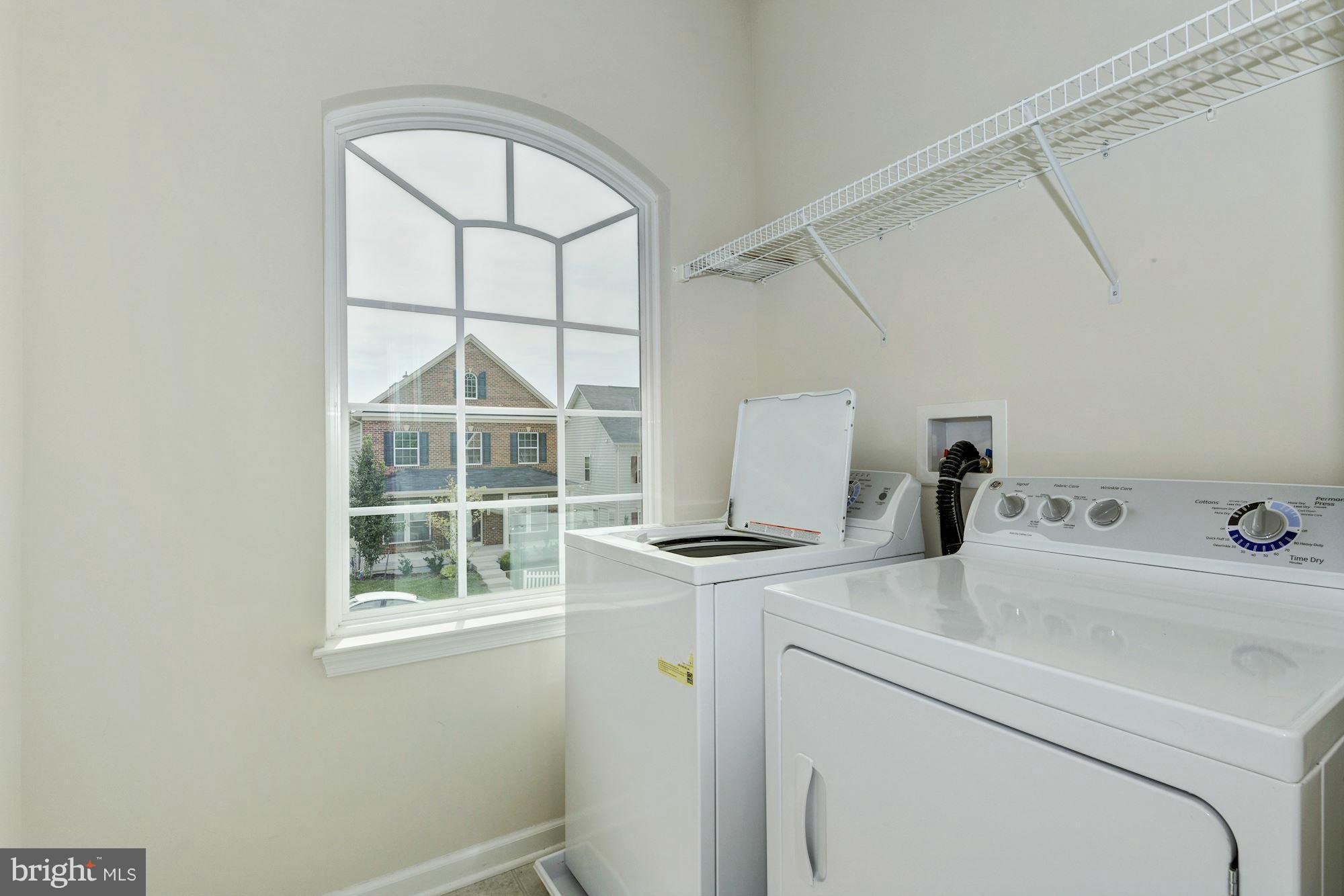 2644 St Marys View Road Accokeek, MD 20607 - Photo 25 of 29 a view of storage and utility room with washer and dryer