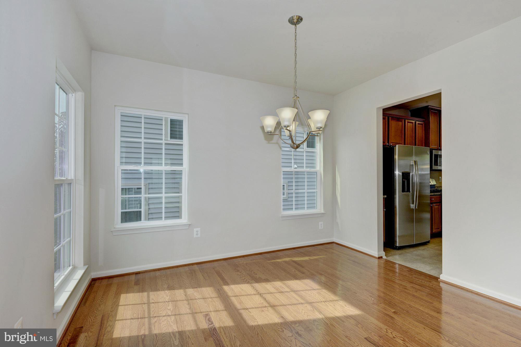 2644 St Marys View Road Accokeek, MD 20607 - Photo 6 of 29 a view of an empty room with a window and wooden floor