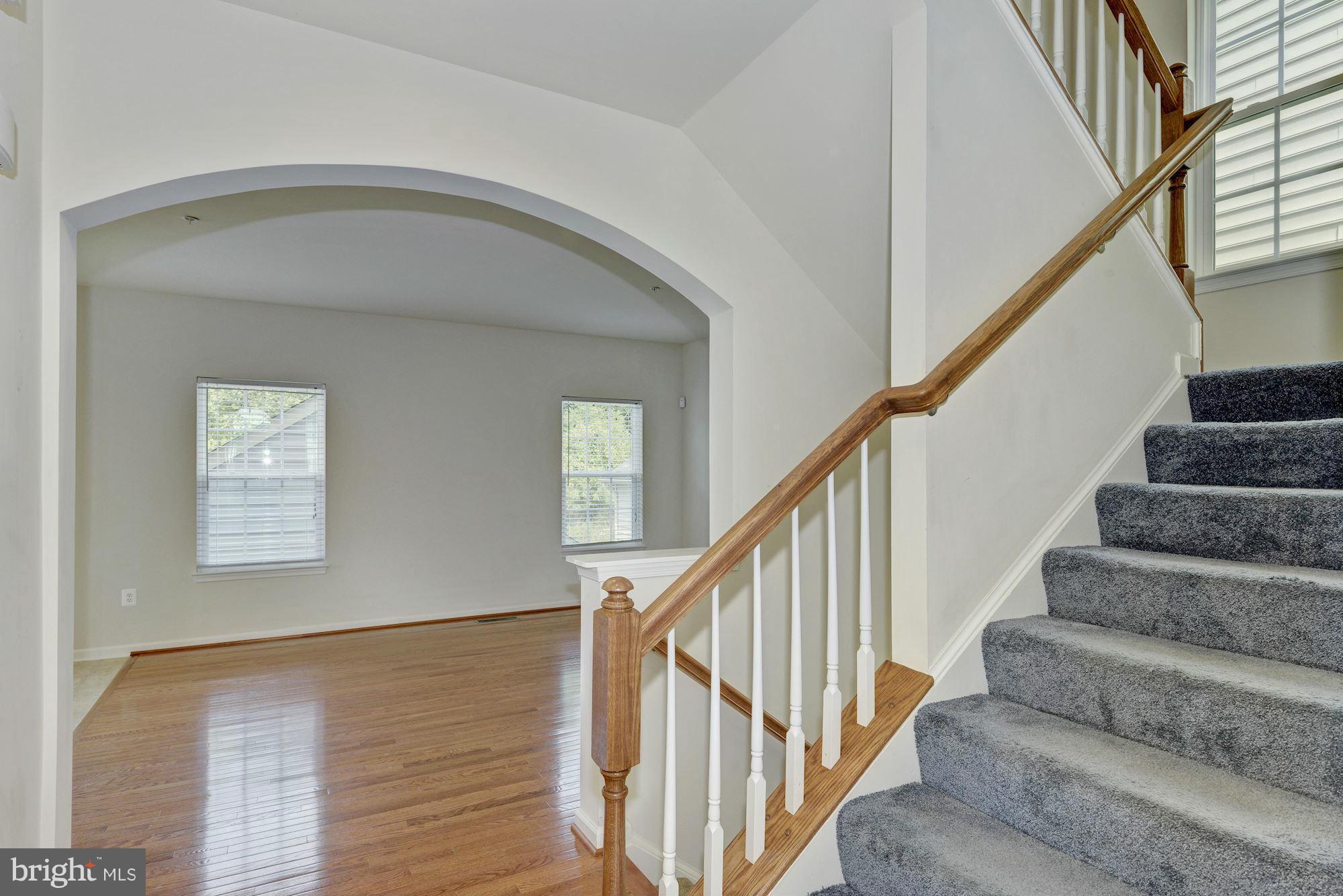 2644 St Marys View Road Accokeek, MD 20607 - Photo 8 of 29 a view of staircase with white walls and a window