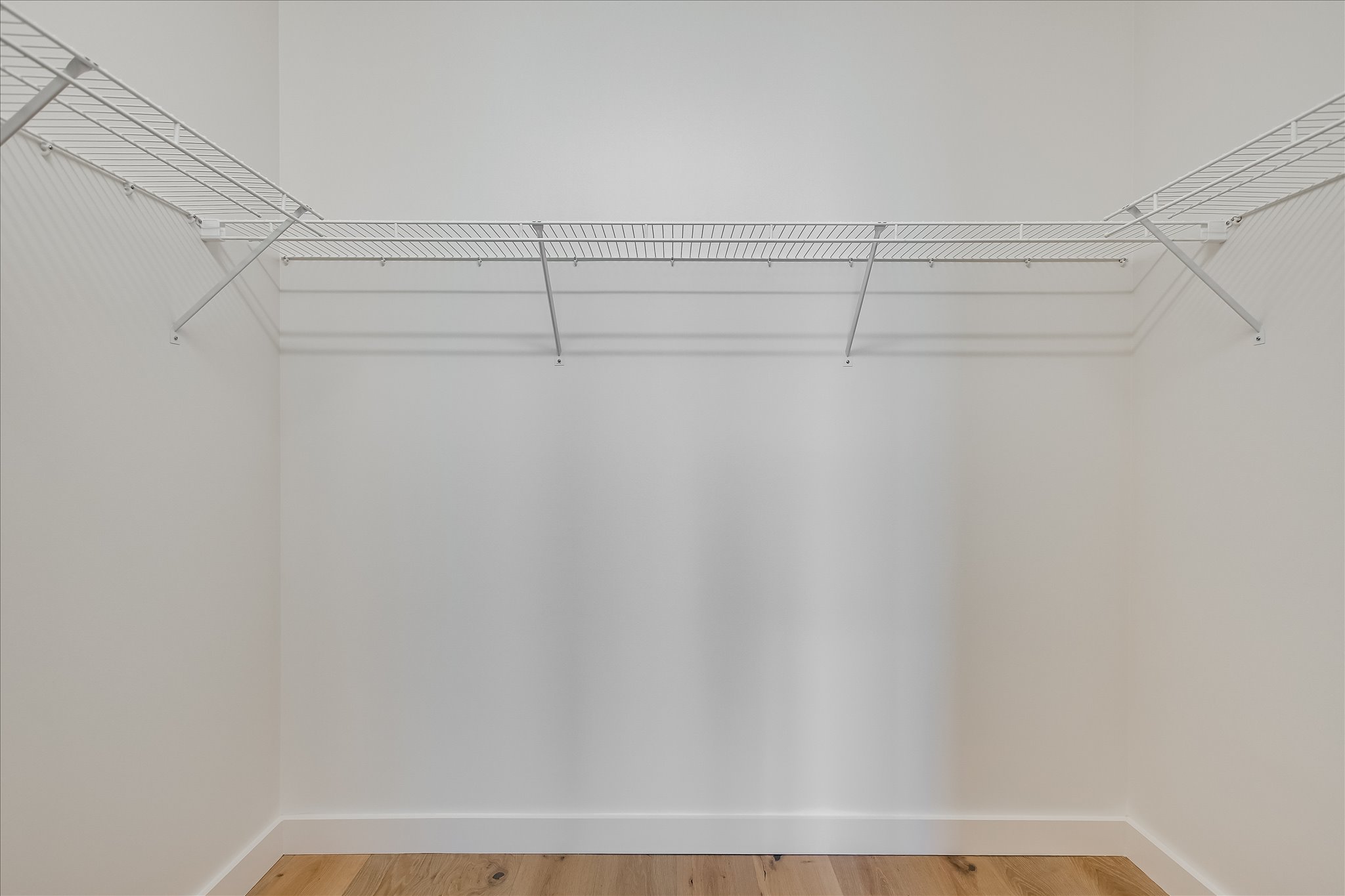 610 Davis Street, Unit 2705 Austin, TX 78701 - Photo 10 of 33 a view of a room with racks on the wall