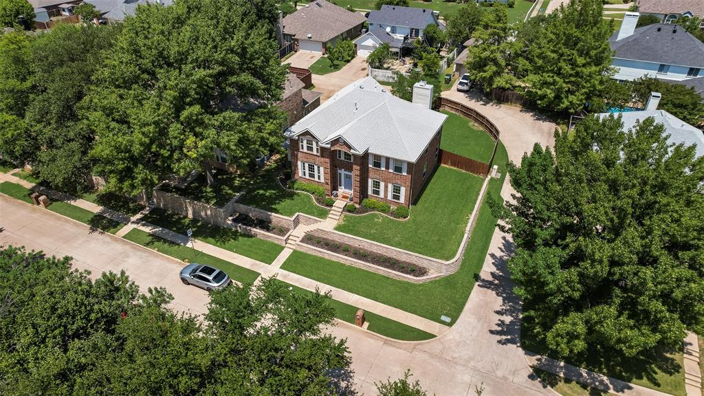 1406 West Peters Colony Road Carrollton, TX 75007 - Photo 18 of 29 an aerial view of a house