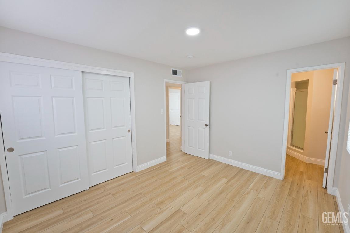 Undisclosed Address Bakersfield, CA 93304 - Photo 13 of 20 wooden floor in an empty room