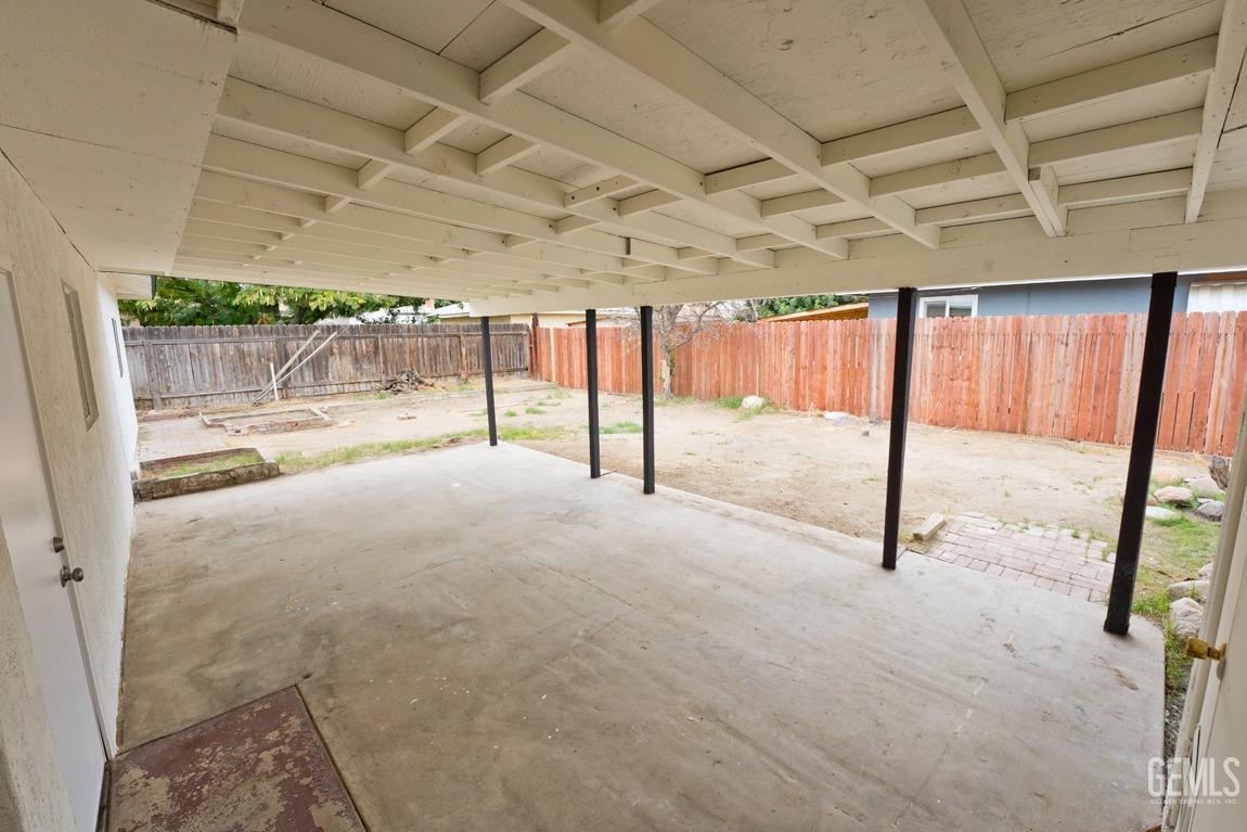 Undisclosed Address Bakersfield, CA 93304 - Photo 17 of 20 a view of a room with wooden walls