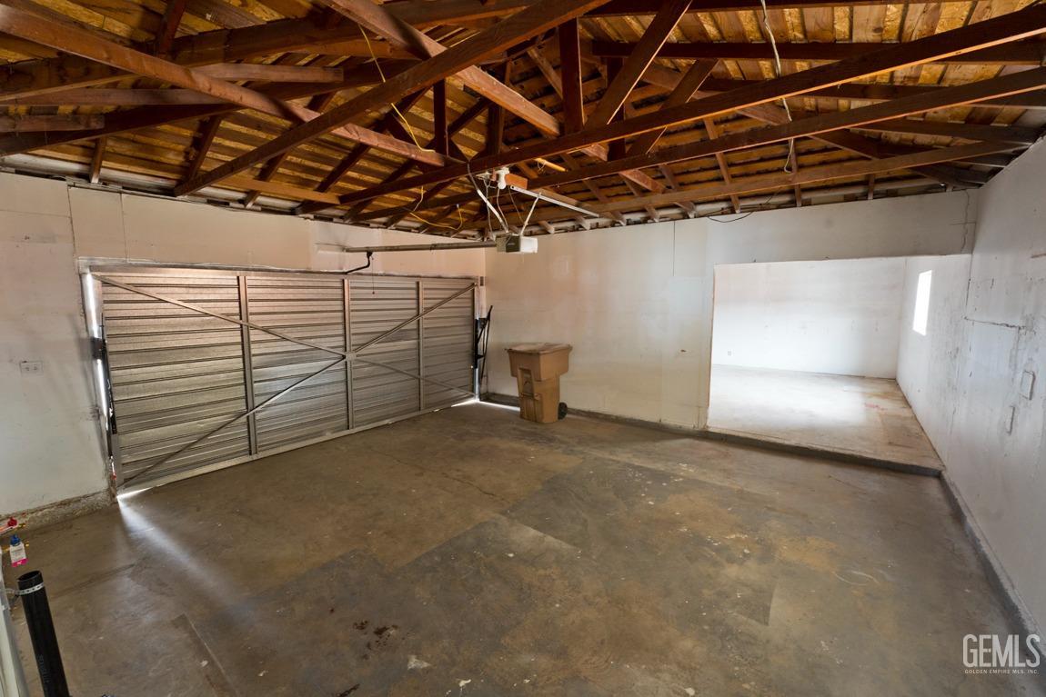 Undisclosed Address Bakersfield, CA 93304 - Photo 19 of 20 a view of a room with racks on the wall