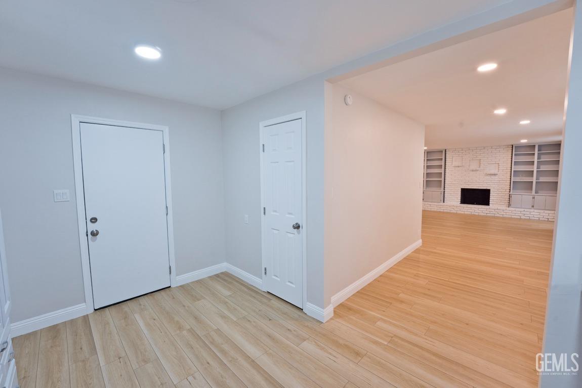 Undisclosed Address Bakersfield, CA 93304 - Photo 8 of 20 a view of empty room with wooden floor