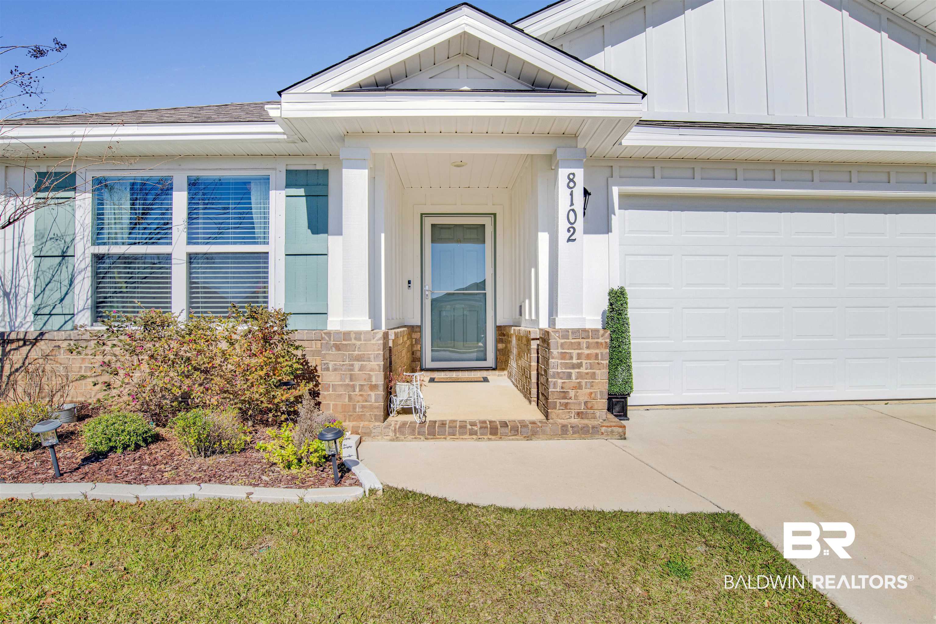 8102 Irwin Loop Daphne, AL 36526 - Photo 1 of 30 View of front facade with a garage