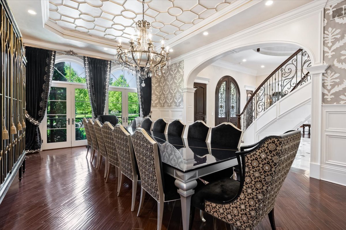 319 Sheridan Road Winnetka, IL 60093 - Photo 35 of 81 a view of a dining room with furniture a chandelier and wooden floor
