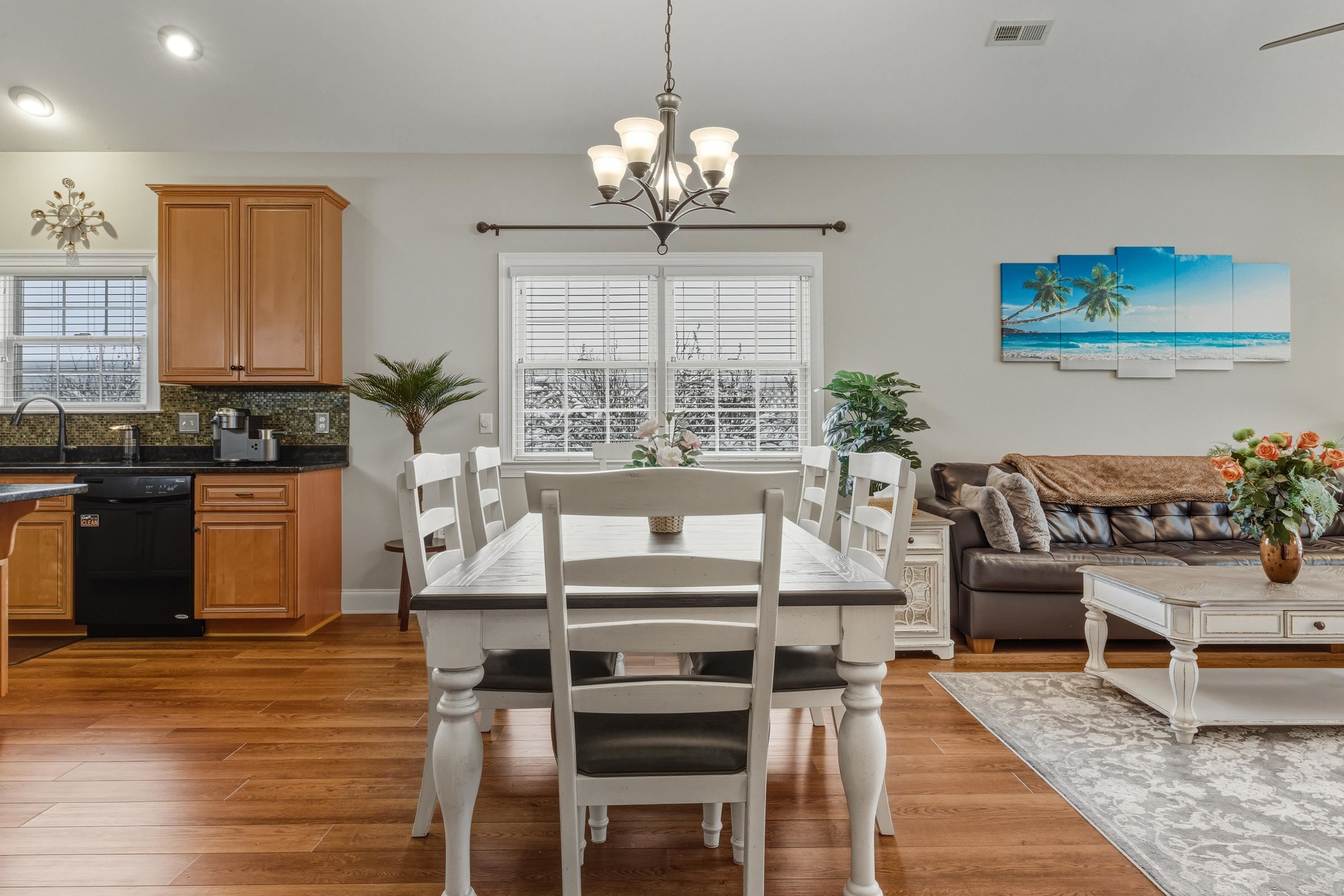 470 Callaway Circle Harrisonburg, VA 22801 - Photo 13 of 73 Directly off the kitchen space is a dining area featuring elevated ceilings, chandelier, and plenty of space for a table & chairs set.