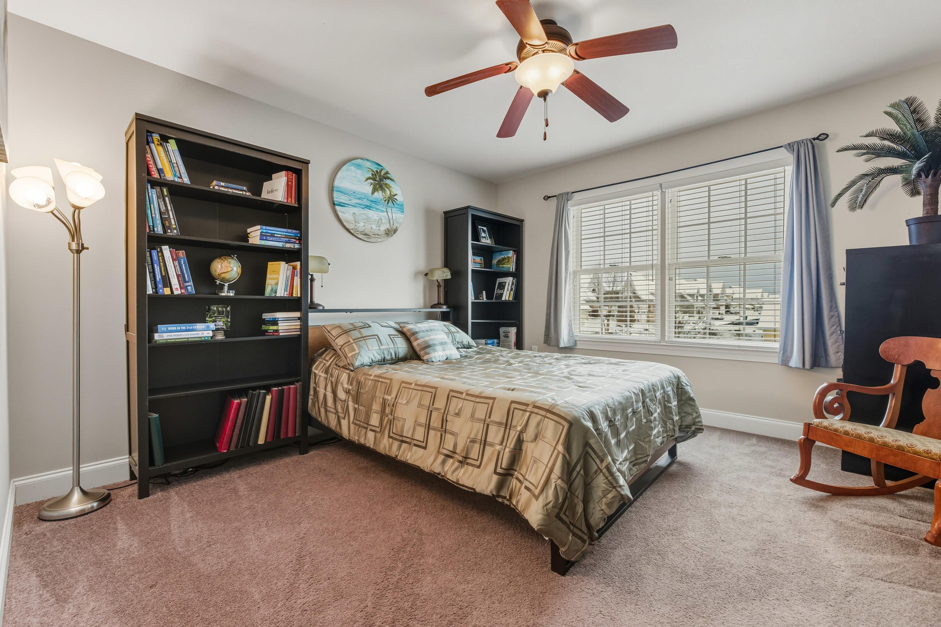 470 Callaway Circle Harrisonburg, VA 22801 - Photo 37 of 73 a spacious bedroom with a bed a couch and a large window