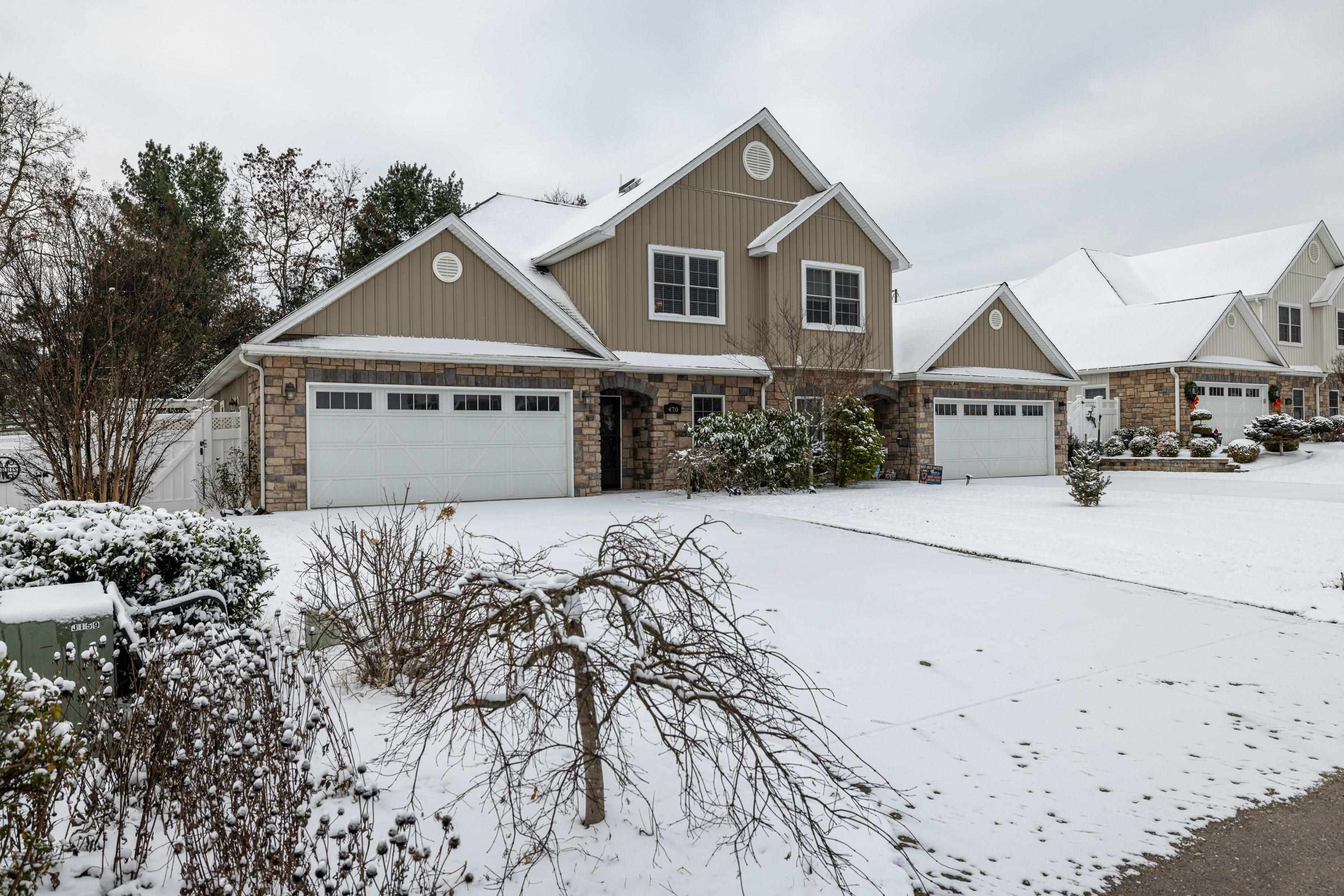 470 Callaway Circle Harrisonburg, VA 22801 - Photo 46 of 73 a front view of a house with a yard covered in snow
