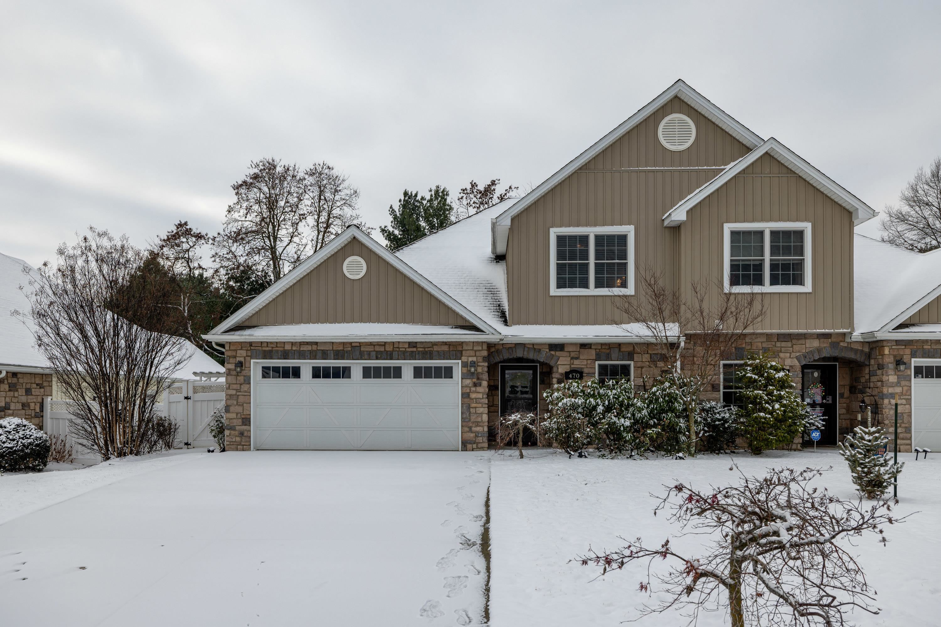 470 Callaway Circle Harrisonburg, VA 22801 - Photo 47 of 73 a front view of a house with a yard and garage