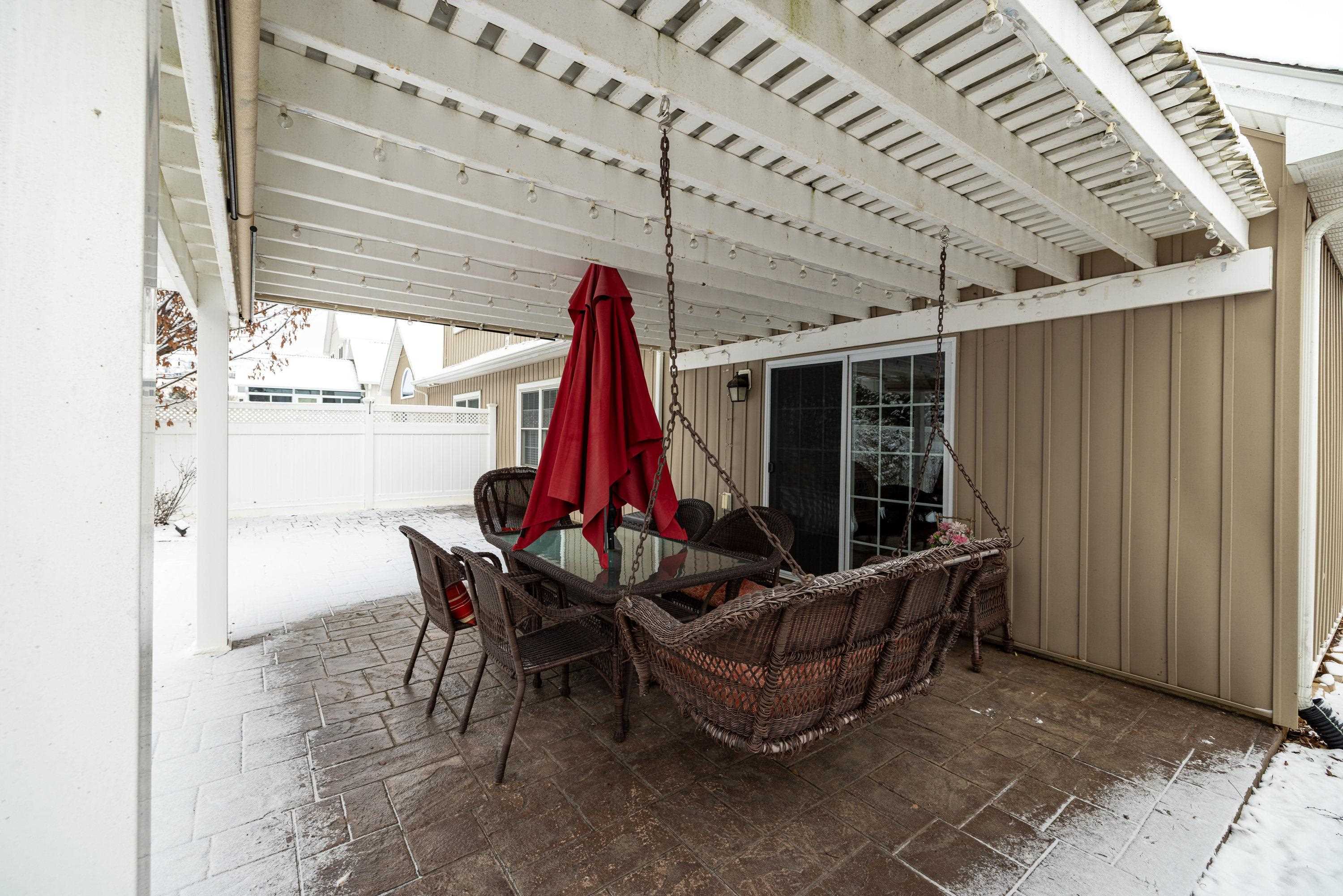 470 Callaway Circle Harrisonburg, VA 22801 - Photo 60 of 73 The backyard of the home features a large patio and covered patio area. The backyard offers mature landscaping, a mostly level lot, and is fully fenced with yinyl fencing.