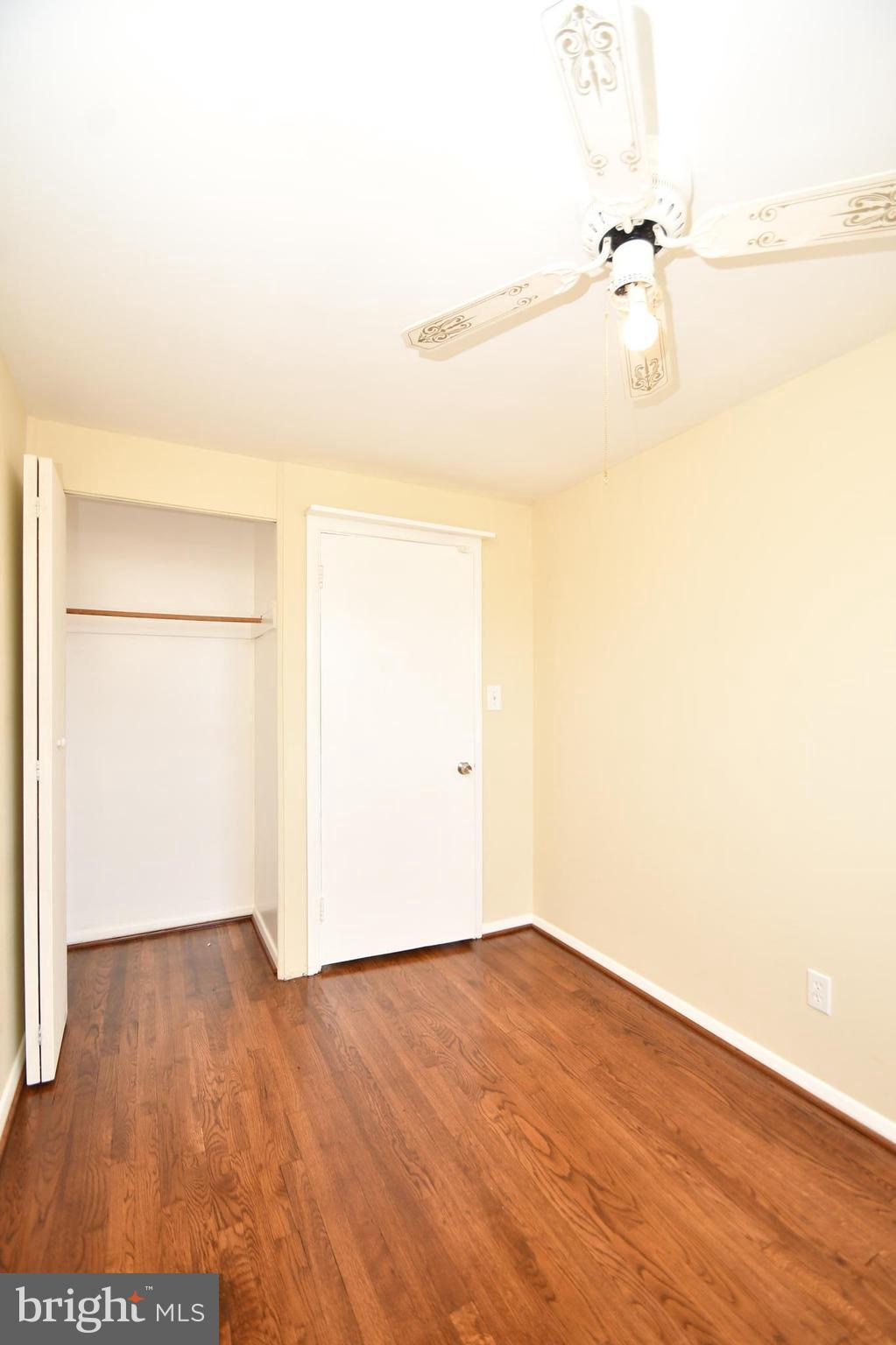 7826 Kentley Road Dundalk, MD 21222 - Photo 14 of 21 a view of a room with wooden floor