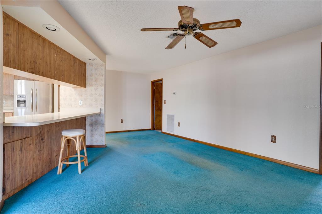 12161 100th Avenue Seminole, FL 33772 - Photo 13 of 34 a view of room with window and a ceiling fan