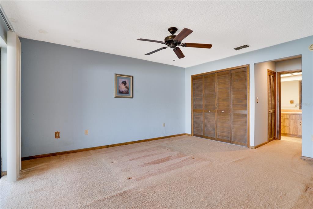 12161 100th Avenue Seminole, FL 33772 - Photo 22 of 34 a view of an empty room with a window