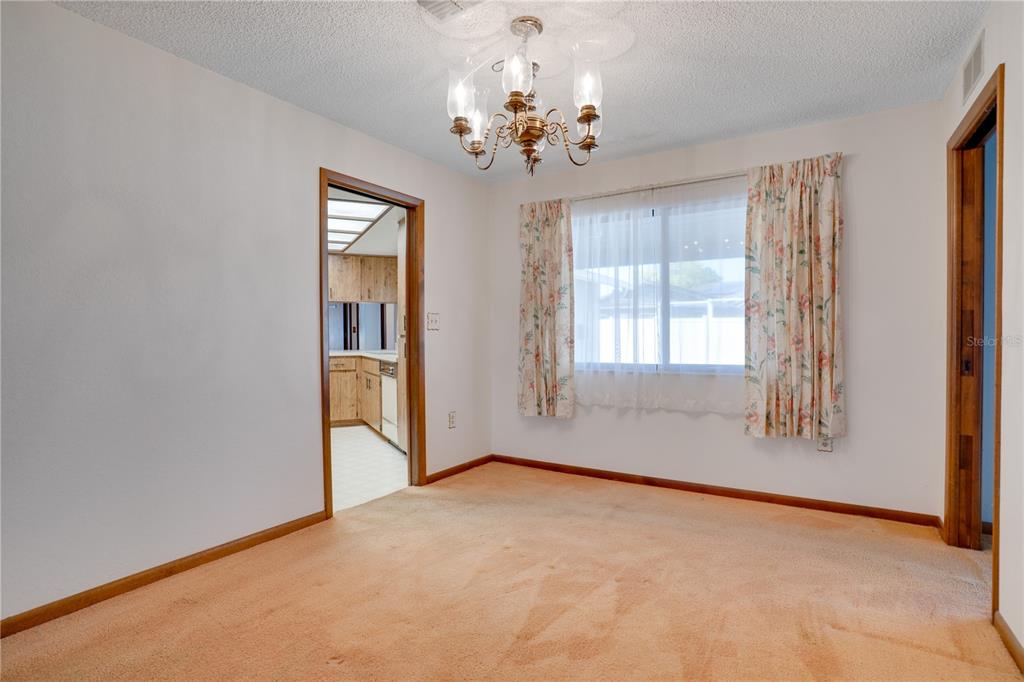 12161 100th Avenue Seminole, FL 33772 - Photo 24 of 34 a view of an empty room with a window