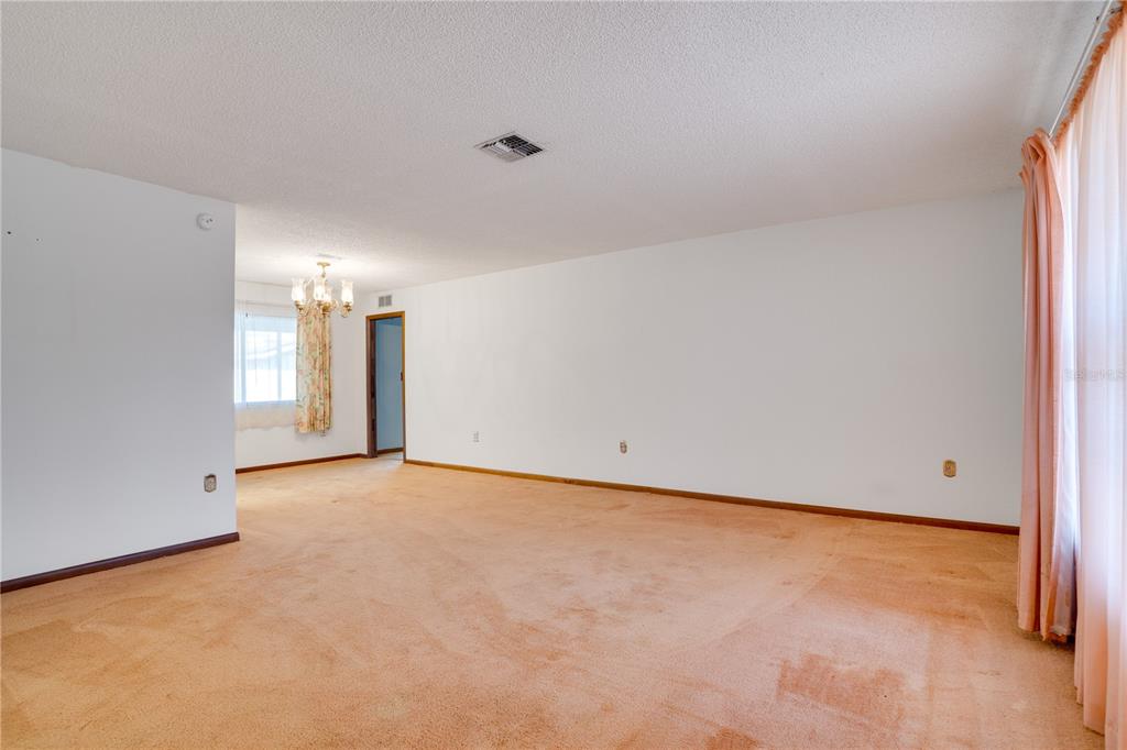 12161 100th Avenue Seminole, FL 33772 - Photo 27 of 34 a view of an empty room with a window