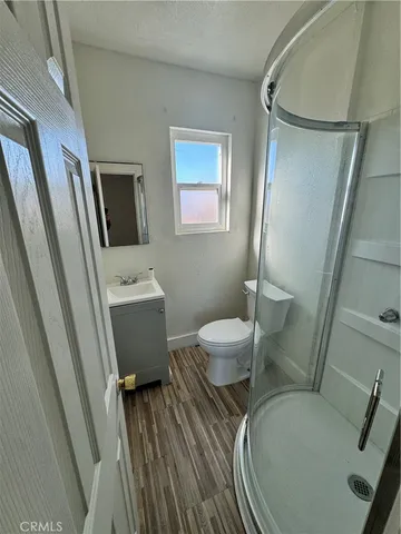 a bathroom with a toilet and a sink