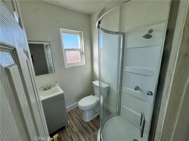 a bathroom with a toilet and a sink