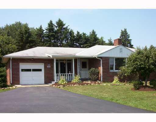 Exterior Front. Brick ranch on double lot.  1/2 way between Hermitage and Greenville just off Rt. 18.