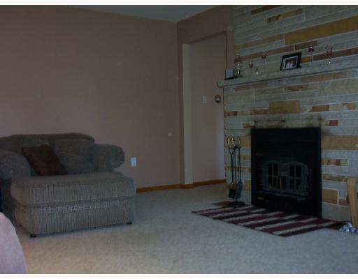 1242 Rutledge Road Transfer, PA 16154 - Photo 6 of 8 Exterior Front. Living room with fireplace.