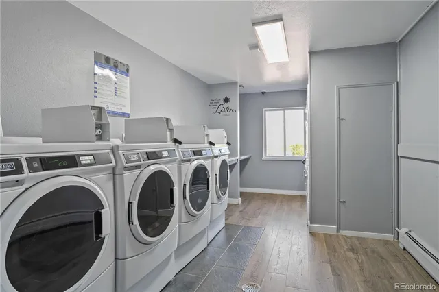 a view of a hallway with washer and dryer