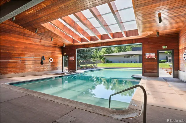 a view of a swimming pool with a patio
