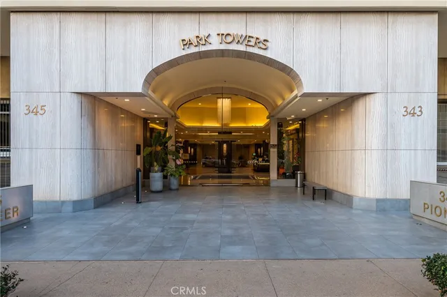 a view of a utility room with a sink and furniture