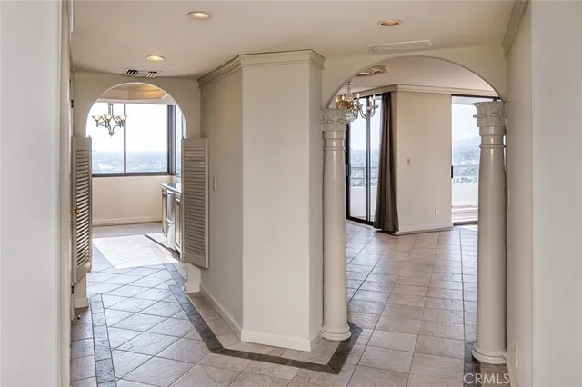 a view of an empty room with a sliding door