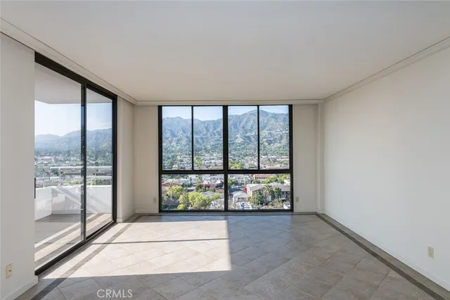 a view of a balcony with chandelier